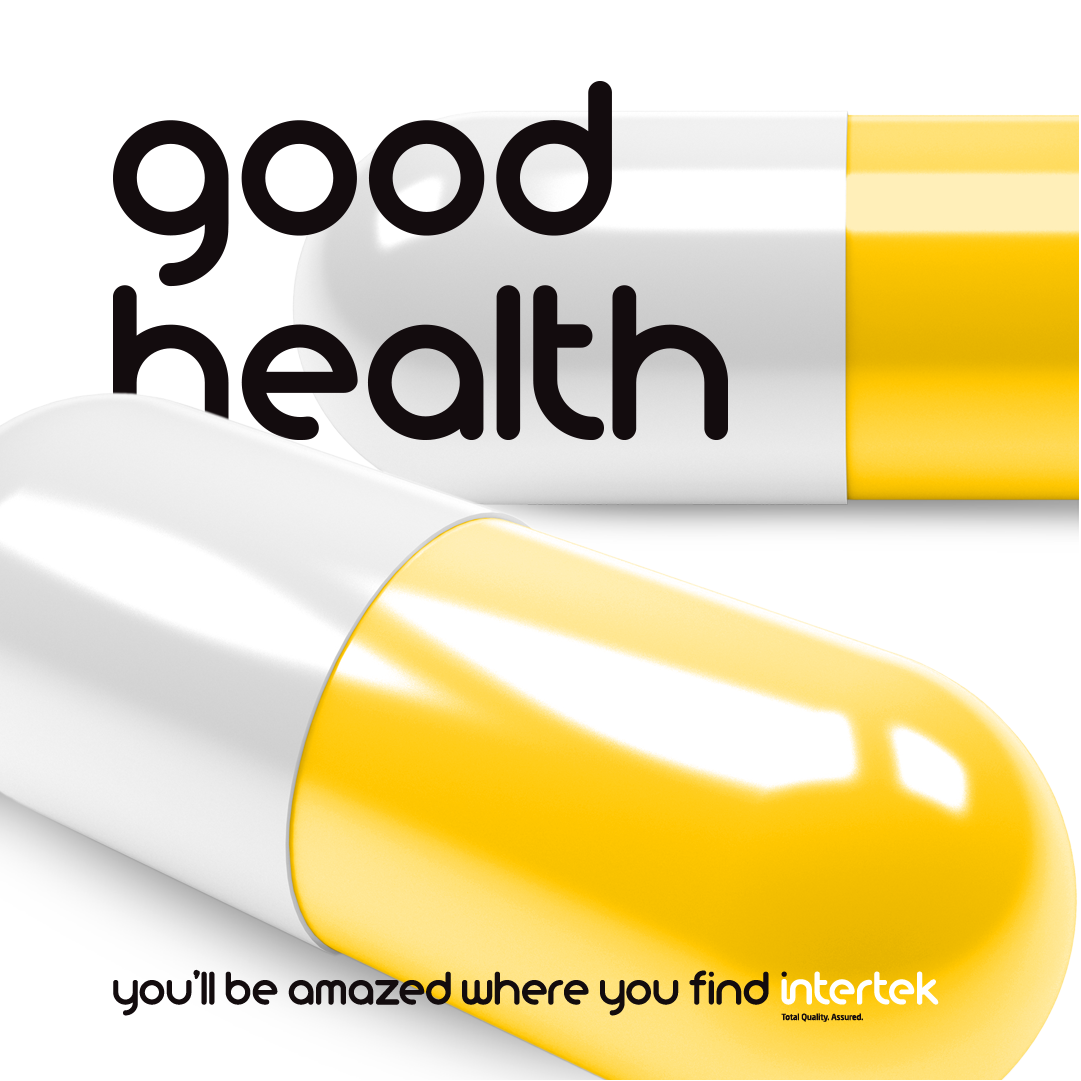 A close-up of a green pill labeled "Good Health," symbolizing wellness and vitality.