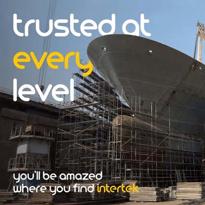 The bow of a large ship in drydock